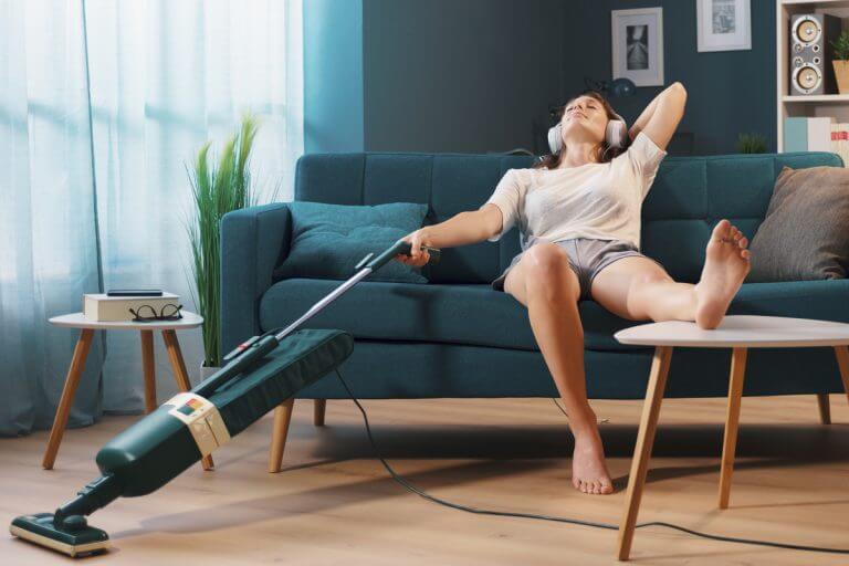 woman-vacuuming-on-couch